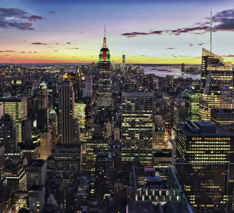 Empire State Building and Midtown skyline at sunset seen from Top of the Rock.