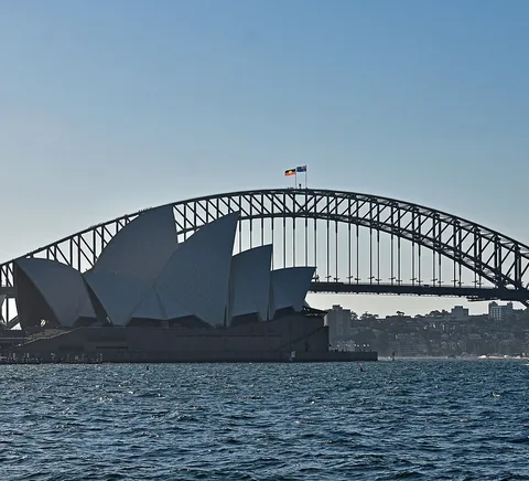 Opera House, Harbour Bridge and water seen from Fleet Steps, 2024.